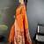 Women orange   floral motifs lichi silk saree