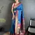 Women rama blue floral motifs lichi silk saree
