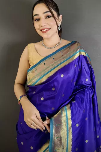 Women royal blue floral motifs lichi silk saree