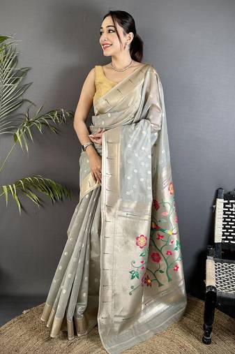 Women grey parrot & floral woven design tissue saree