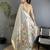 Women grey parrot & floral woven design tissue saree