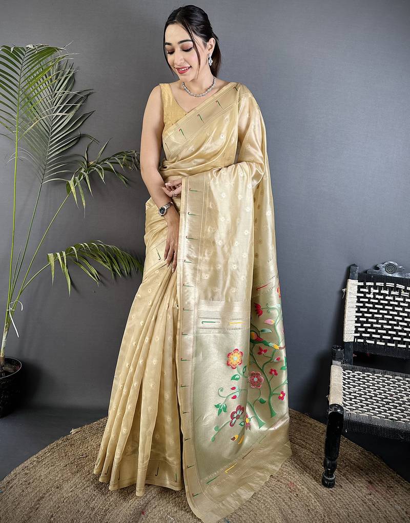 Women beige parrot & floral woven design tissue saree