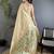 Women beige parrot & floral woven design tissue saree