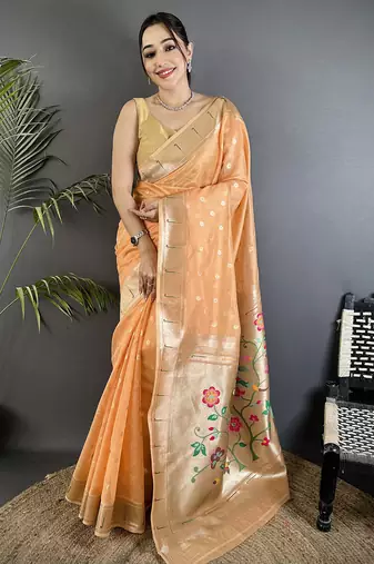 Women peach parrot & floral woven design tissue saree