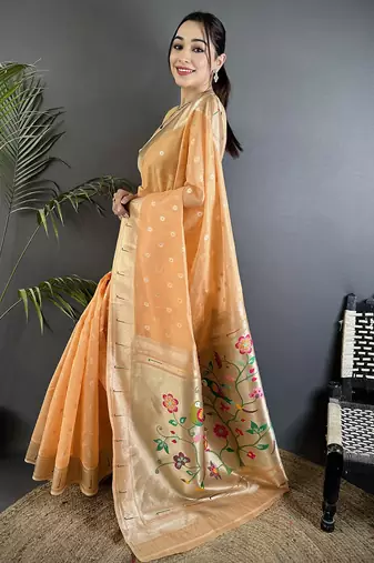 Women peach parrot & floral woven design tissue saree