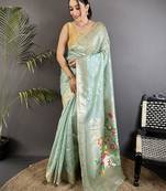Women sky blue parrot & floral woven design tissue saree