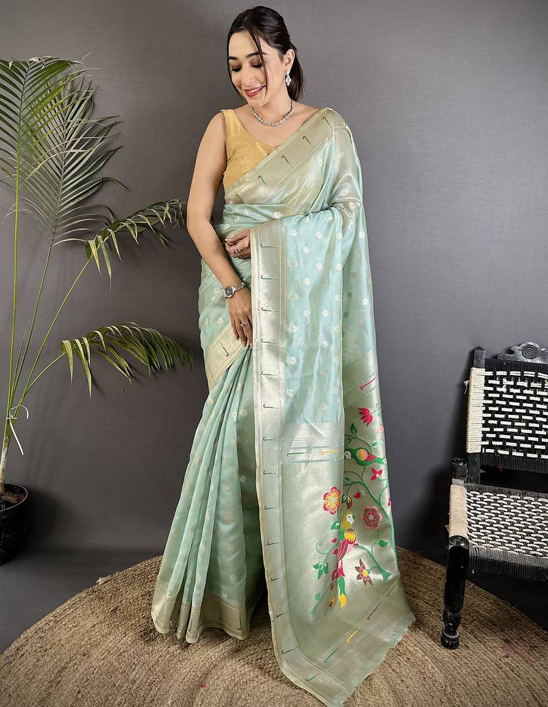 Women sky blue parrot & floral woven design tissue saree