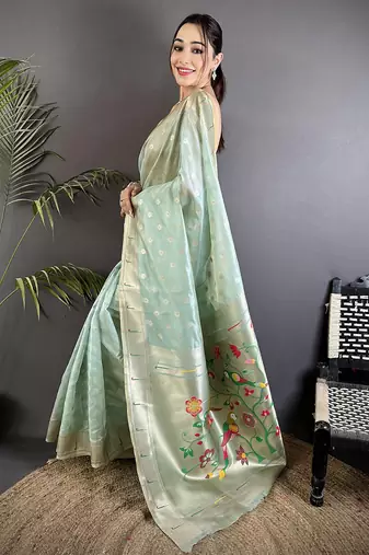 Women sky blue parrot & floral woven design tissue saree