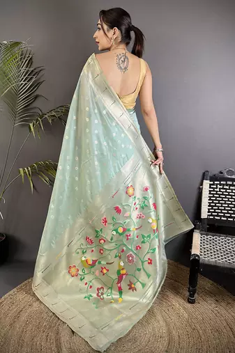 Women sky blue parrot & floral woven design tissue saree