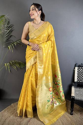 Women yellow parrot & floral woven design tissue saree