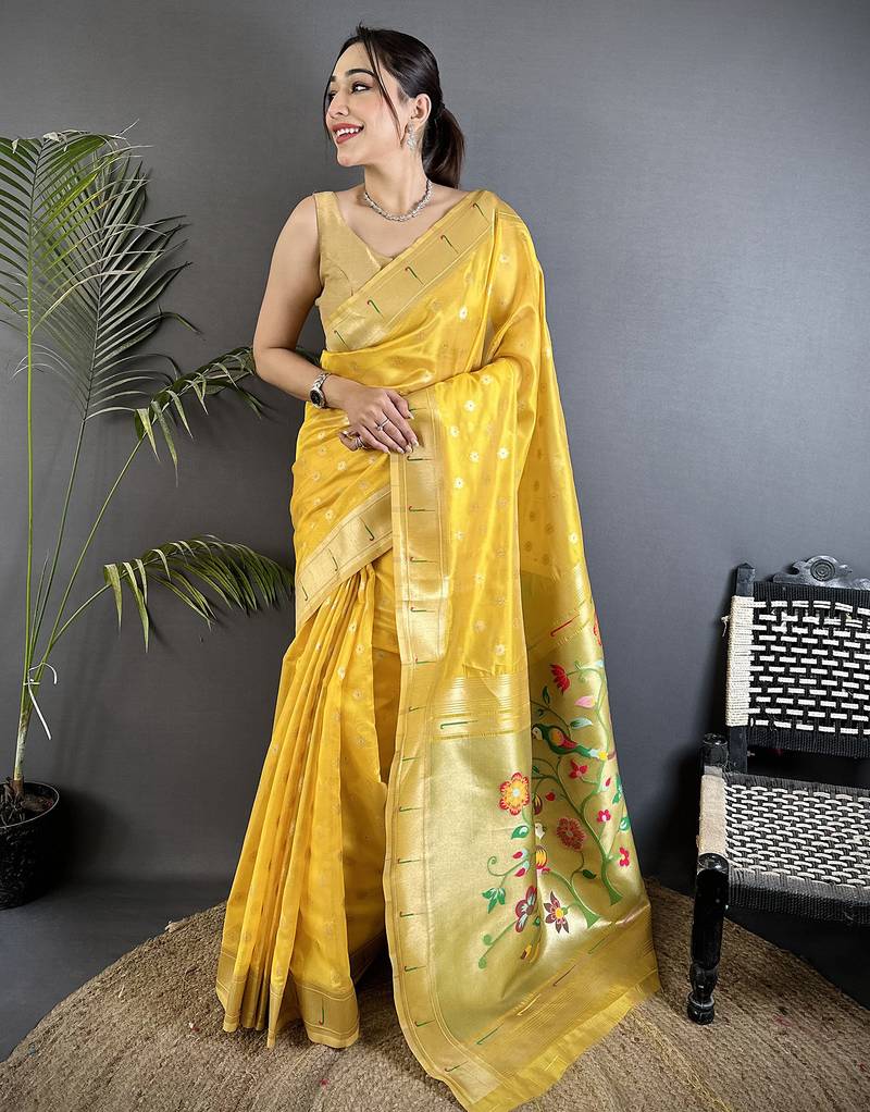 Women yellow parrot & floral woven design tissue saree