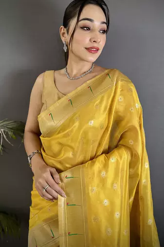 Women yellow parrot & floral woven design tissue saree