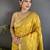 Women yellow parrot & floral woven design tissue saree
