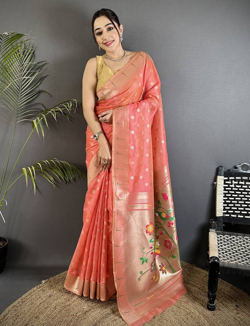 Women pink parrot & floral woven design tissue saree