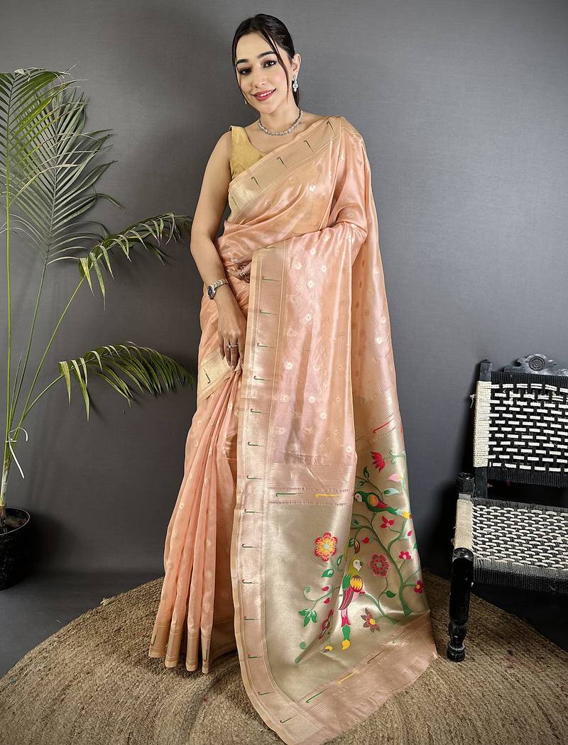 Women coral pink parrot & floral woven design tissue saree