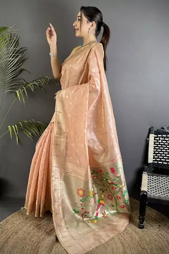 Women coral pink parrot & floral woven design tissue saree