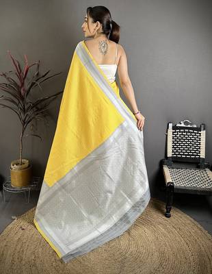 Women yellow intricate geometric soft silk saree 4