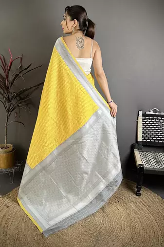 Women yellow intricate geometric soft silk saree
