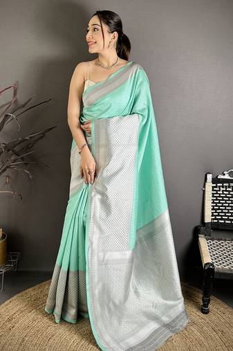 Women mint green   intricate geometric soft silk saree