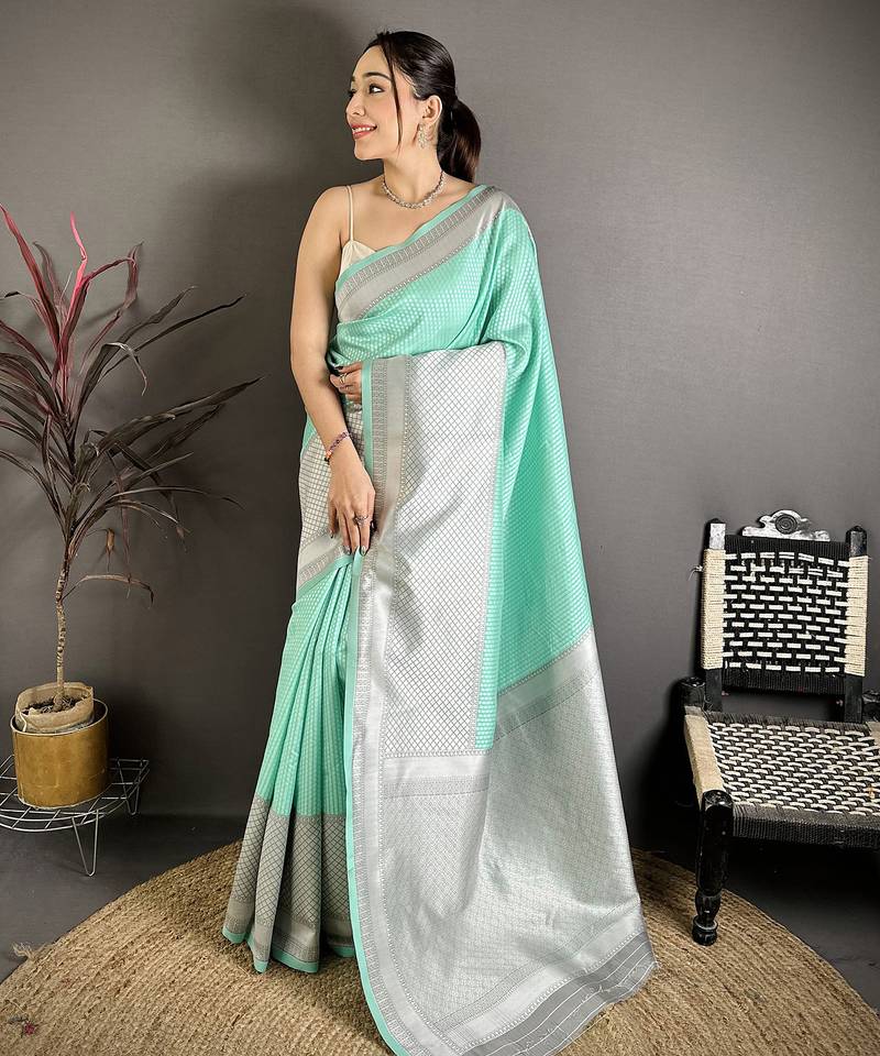 Women mint green   intricate geometric soft silk saree