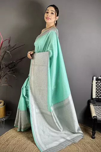 Women mint green   intricate geometric soft silk saree