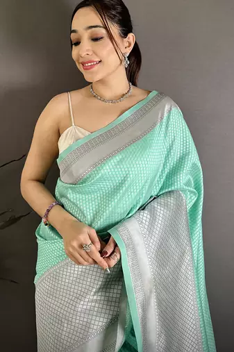 Women mint green   intricate geometric soft silk saree