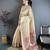 Women beige solid tissue saree
