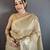 Women beige solid tissue saree