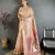 Women peach solid tissue saree