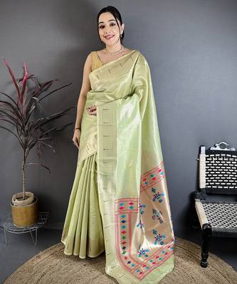 Women light green solid tissue saree 1