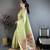 Women light green solid tissue saree