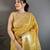 Women golden yellow solid tissue saree