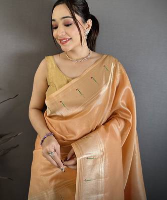 Women orange solid tissue saree 3