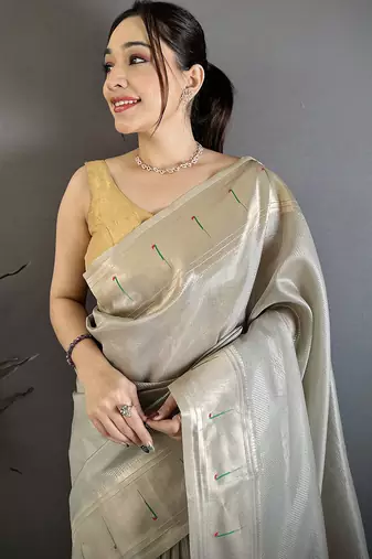 Women grey solid tissue saree