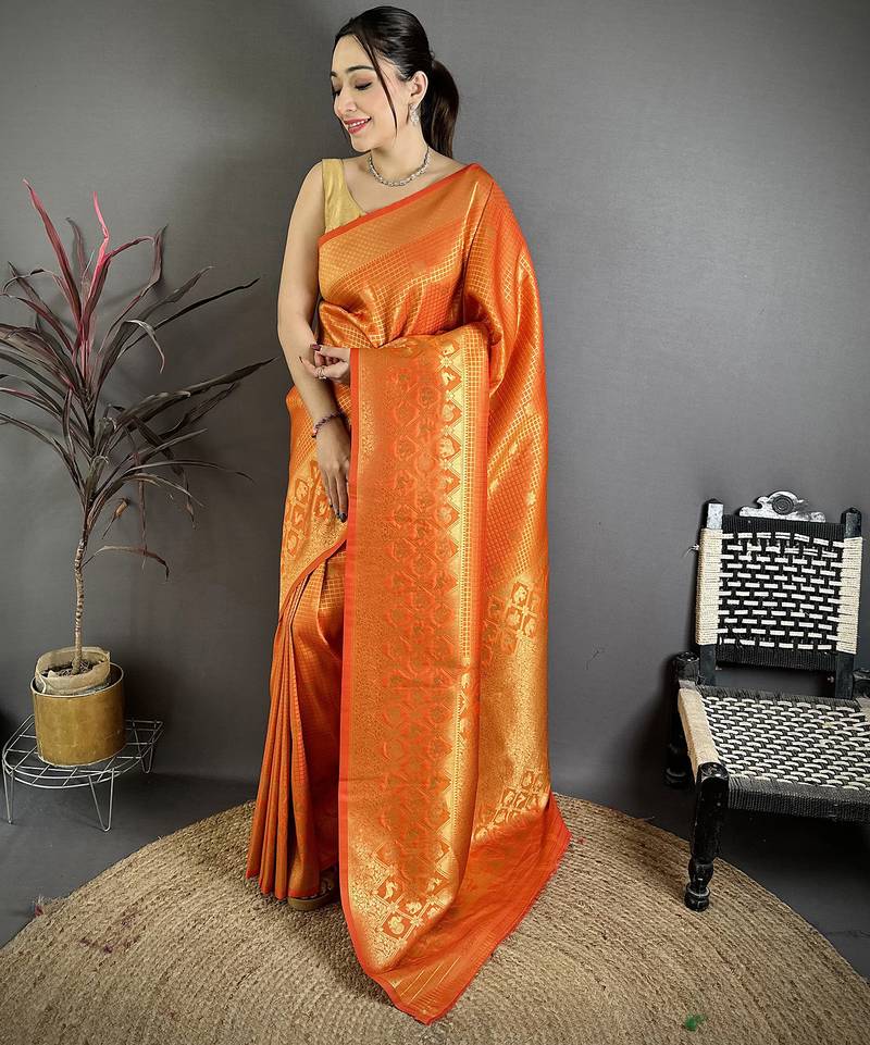 Women orange checked & floral motifs banarasi soft silk saree