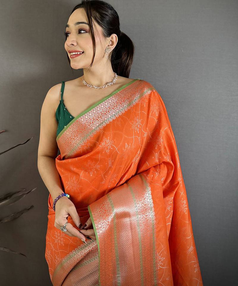 Women orange intricate zari weaving banarasi silk saree