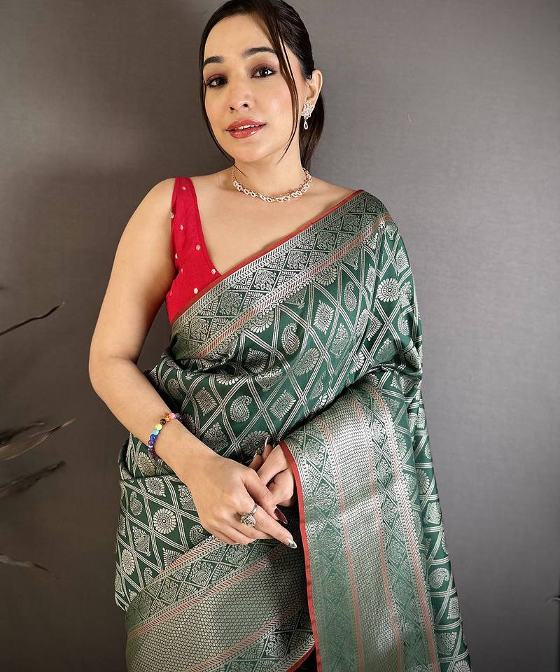 Women green zari woven ethnic motifs banarasi silk saree