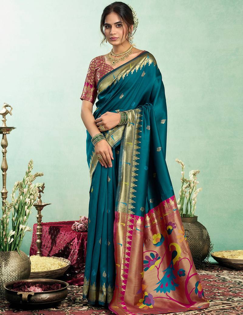 Women  teal blue peacock motifs silk blend saree