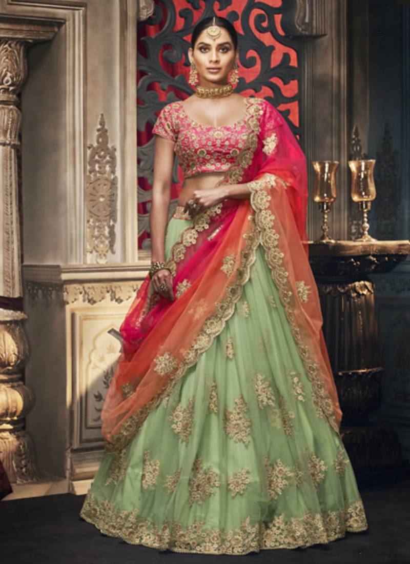 Soft Premium Net Wedding Lehenga In Green With Embroidery & Crystal Stone Work