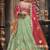 Soft Premium Net Wedding Lehenga In Green With Embroidery & Crystal Stone Work