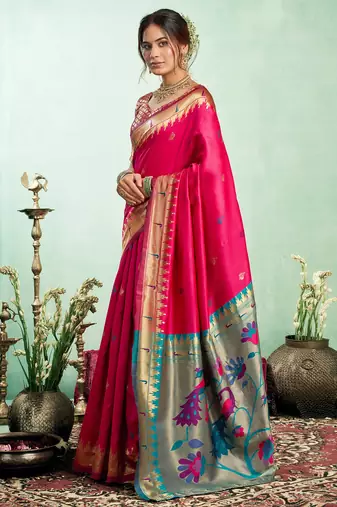 Women pink peacock motifs silk blend saree