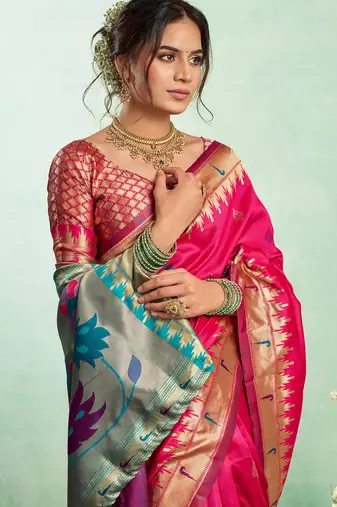 Women pink peacock motifs silk blend saree