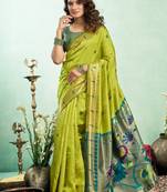 Women lime green peacock motifs silk blend saree