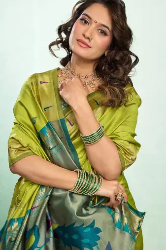 Women lime green peacock motifs silk blend saree