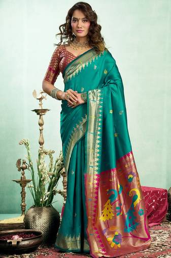 Women dark green peacock motifs silk blend saree