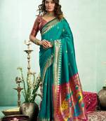 Women dark green peacock motifs silk blend saree