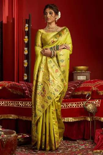 Women lime green floral motifs silk blend saree