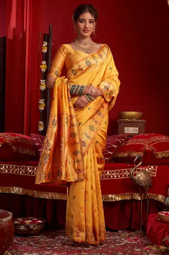 Women light orange floral motifs silk blend saree