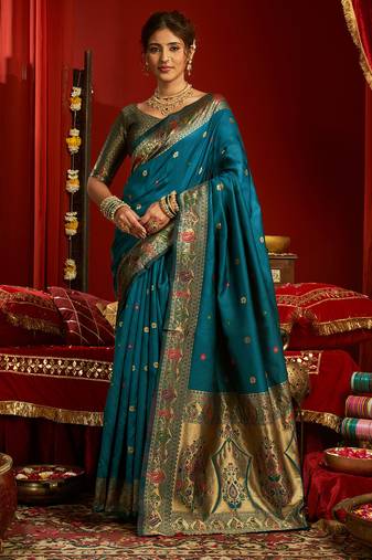 Women dark teal floral motifs silk blend saree