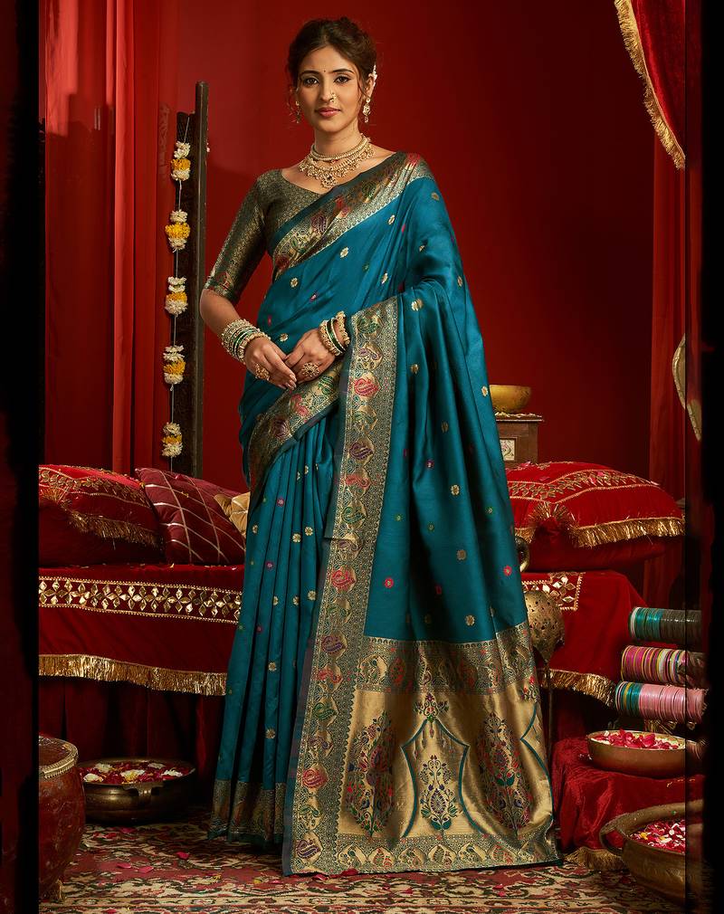 Women dark teal floral motifs silk blend saree